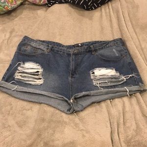 Torn high waisted shorts